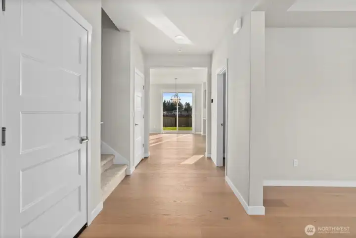 Hardwood floors throughout entry, dining room, nook and kitchen