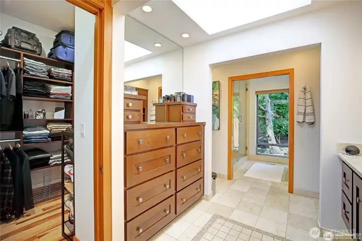 Opposite the sink is a built in dresser.