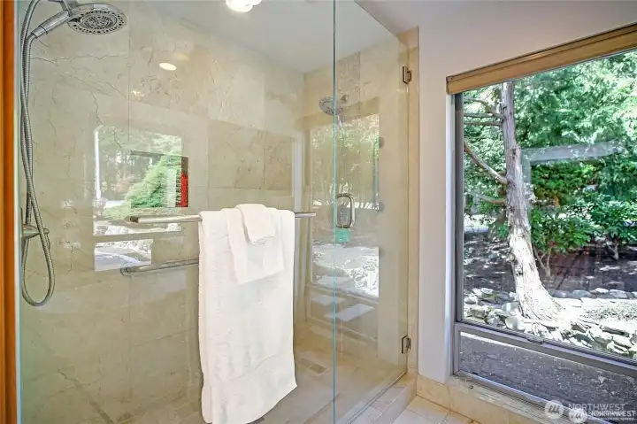 Double shower opposite the tub.