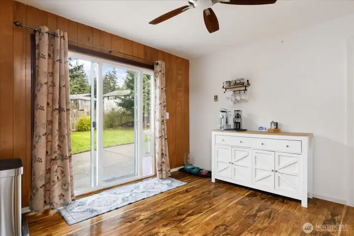 Off the kitchen is the entry to the fenced backyard.