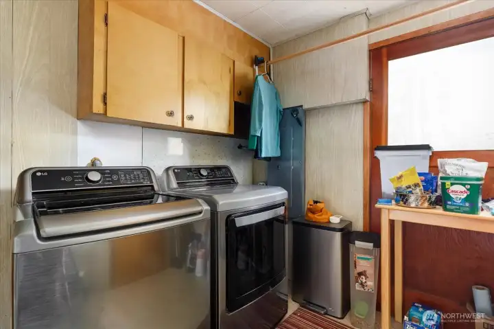Laundry room is found off of the kitchen and connects to the garage.