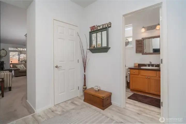 Main bathroom and entry closet