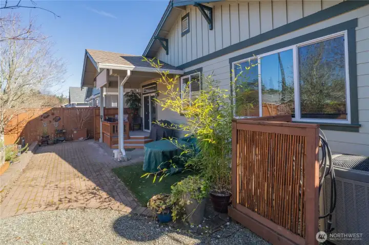 Rear yard fully landscaped with pavers