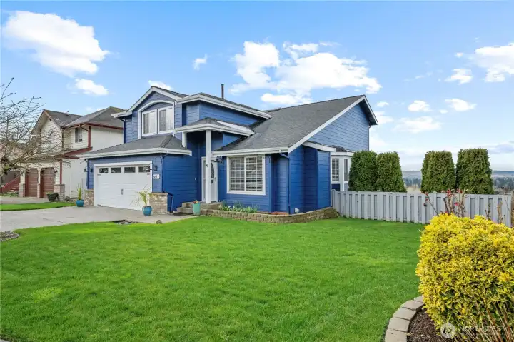 Fresh exterior paint, new siding, new garage door and a new roof give the home a crisp, modern feel.