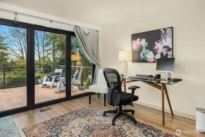 This BR/Office sits next to the Primary. Owners plans included taking out the wall between to make a true 'Primary suite', with Nano doors to the deck.