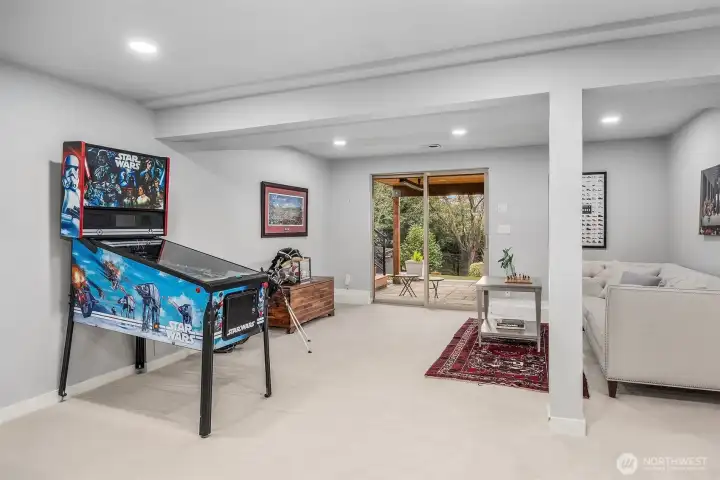 Multiple areas for games, play, conversation...and sliding door opens to the fantastic outdoor spaces.