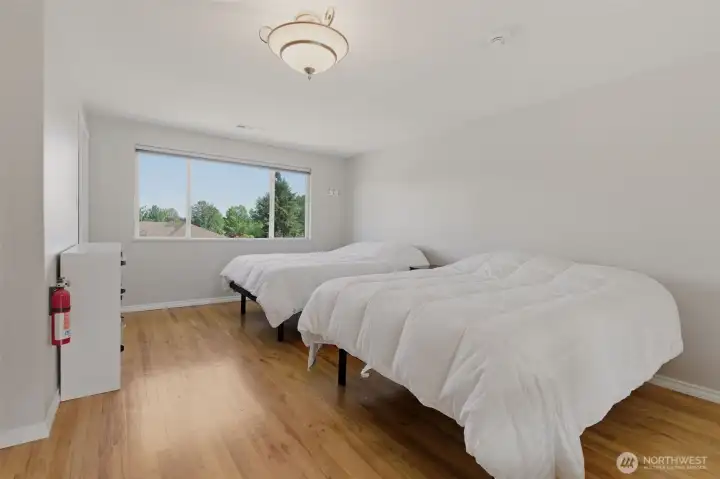 Close-up of sleeping area... currently occupied by two queen size beds