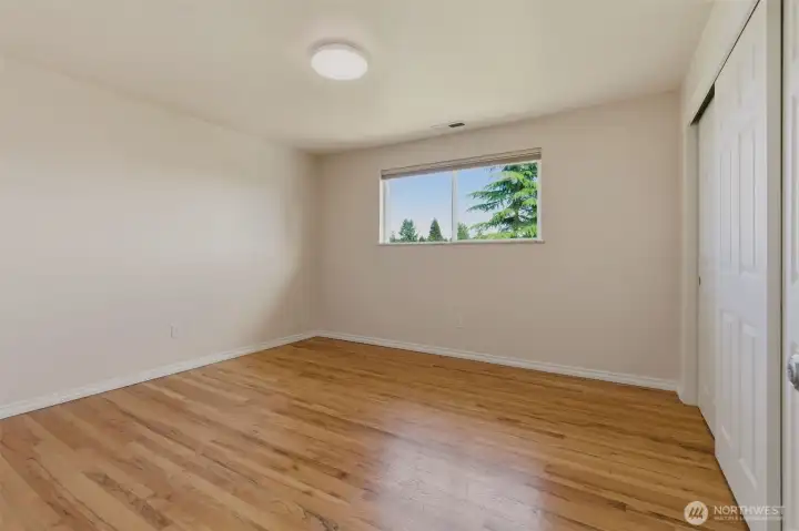 East facing bedroom (12' x 12') affectionately named "Sunrise"