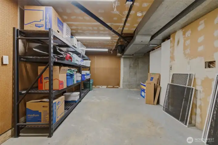 Huge unfinished room in basement - perfect for easily accessible storage, workshop, or man cave