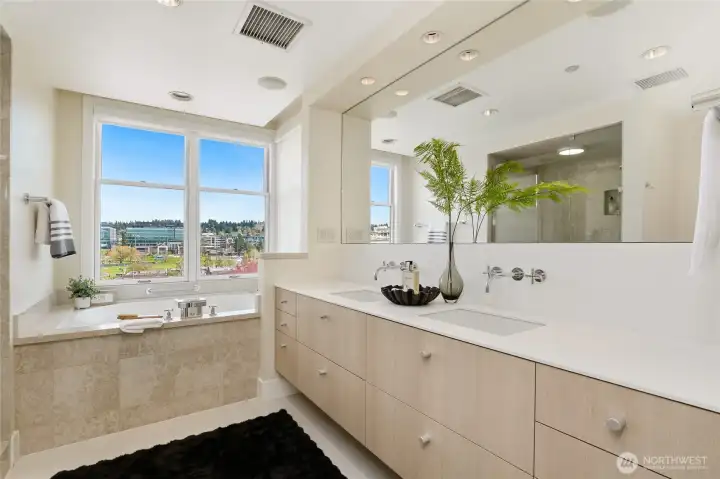 Primary bath with views of the town.