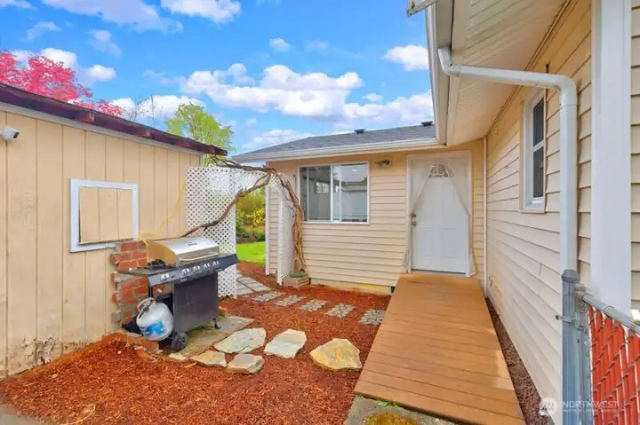 Ramp out the back door into the back yard.