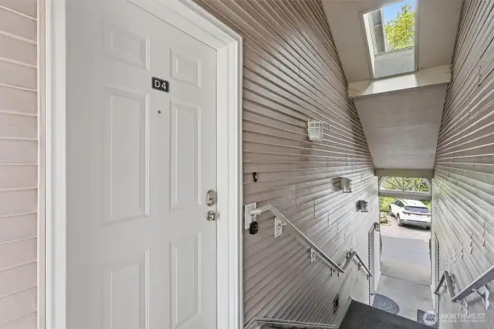 Stairs leading to the unit door