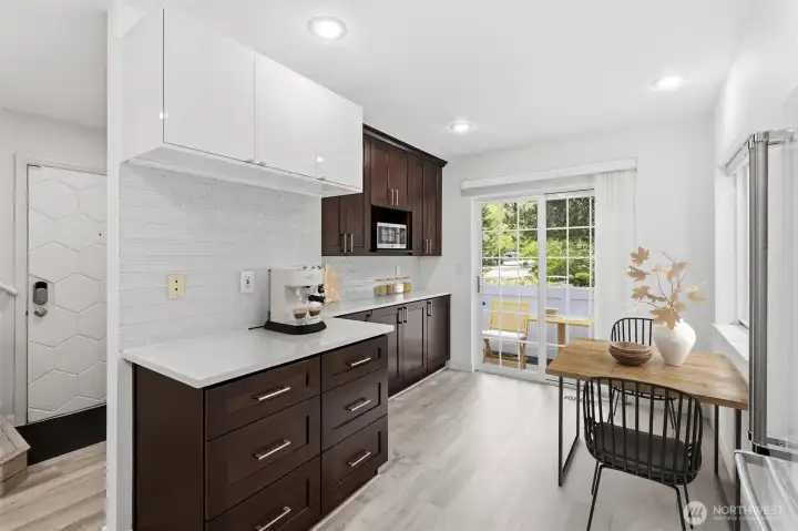 Kitchen w/ breakfast nook (virtually staged)