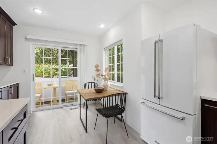 Kitchen w/ breakfast nook (virtually staged)