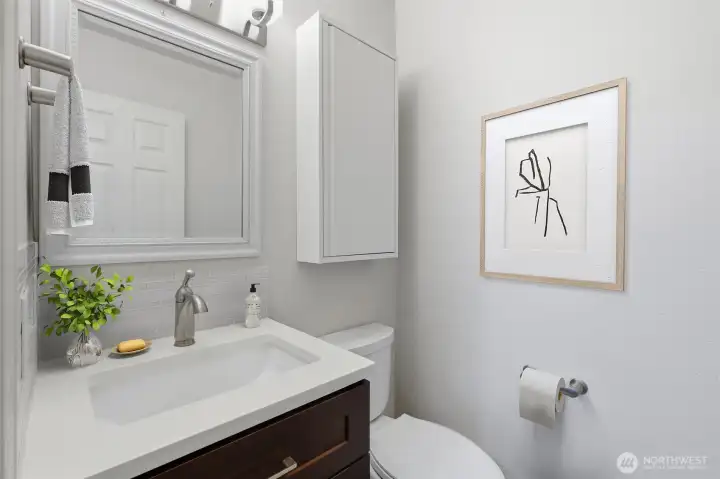 Half bath on main floor (virtually staged)