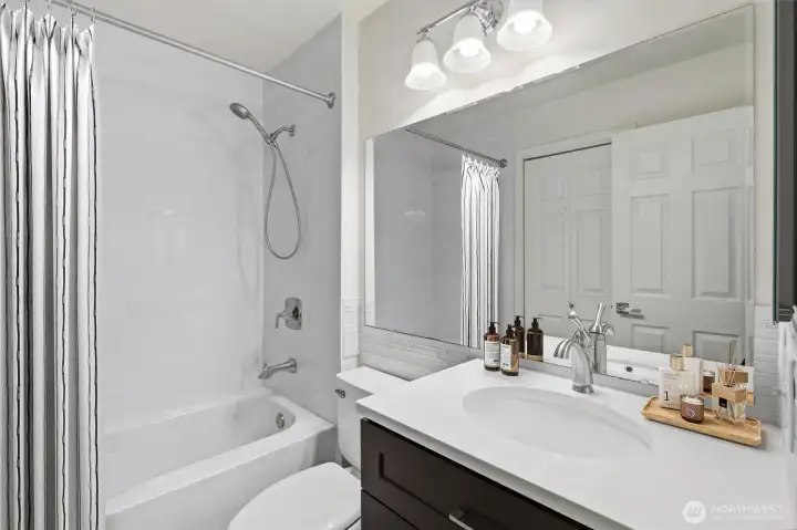 Ensuite primary bedroom (virtually staged)