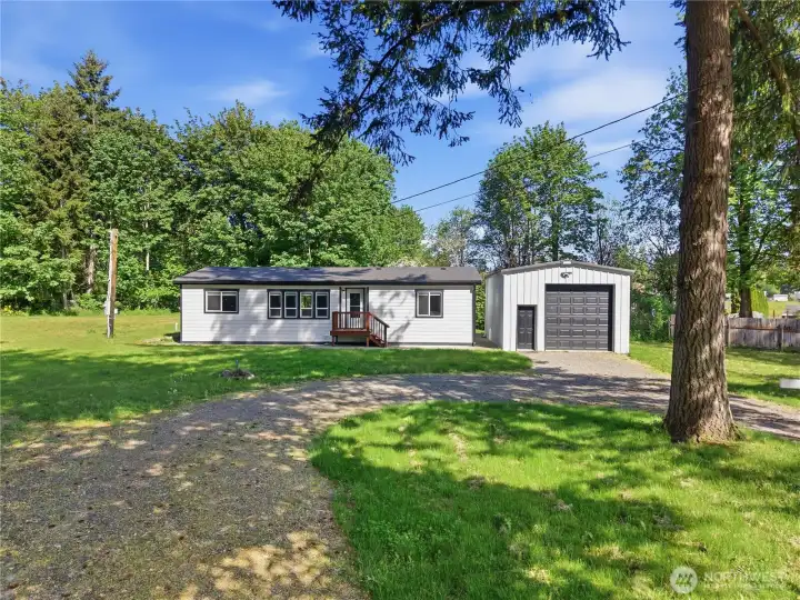 Direct view and close up of the home.  This cul de sac only has three homes on it, which allows plenty of room to park on or off the property.  It is so peaceful and quiet here!