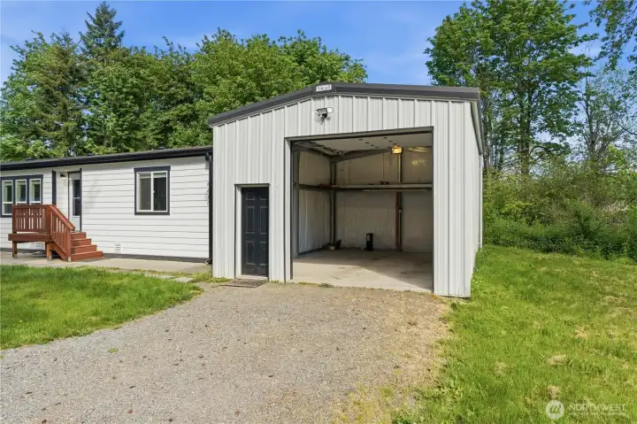 This view offers you a quick look of the interior of the shop with loft for extra storage, cement floor, insulated walls and ceiling complete with a 60A 220 V breaker