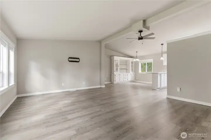 Living area flows into the dining and kitchen