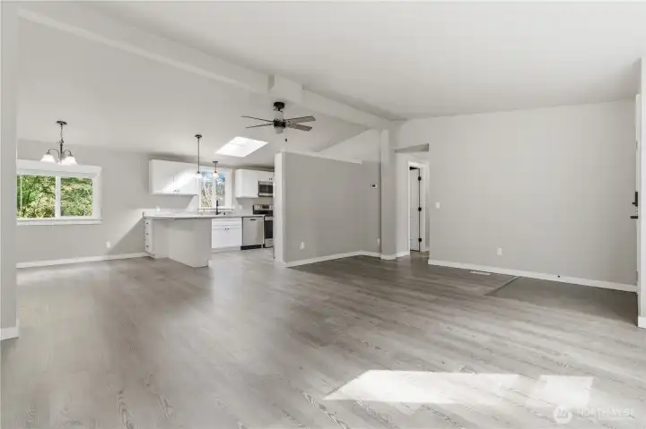 Another view from the front of the home into the dining, working your way into the kitchen.
