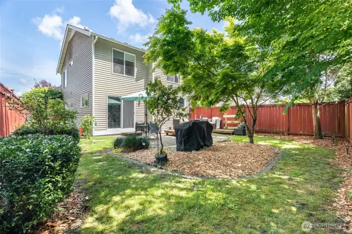Large, fenced yard with fresh mulch!