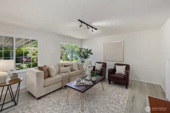 Enjoy ample light in this expansive living room...