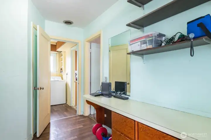Entry with Built in Cabinets and Original Hardwood Flooring Entry with Built in Cabinets and Original Hardwood Flooring