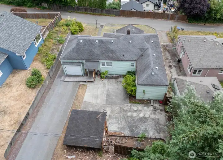 Off street parking in the driveway. Outbuilding for storage Off street parking in the driveway. Outbuilding for storage