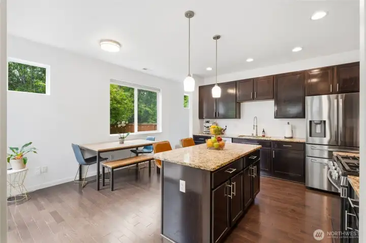 Cook, entertain, and connect in this beautifully appointed kitchen featuring granite countertops, stainless steel appliances, and a large center island. Cook, entertain, and connect in this beautifully appointed kitchen featuring granite countertops, stainless steel appliances, and a large center island.