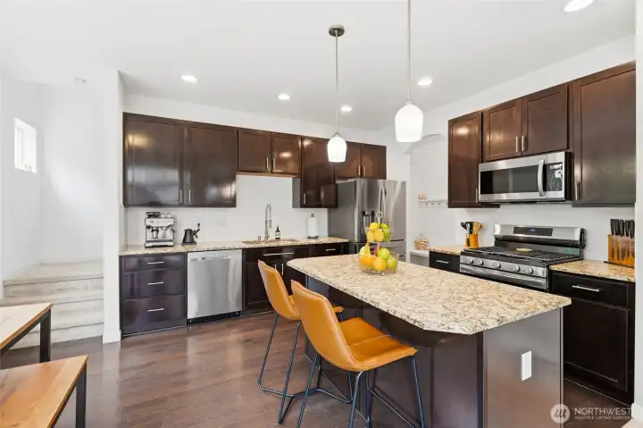 From meal prep to entertaining, this thoughtfully designed kitchen offers generous workspace, abundant cabinetry, and effortless flow. From meal prep to entertaining, this thoughtfully designed kitchen offers generous workspace, abundant cabinetry, and effortless flow.