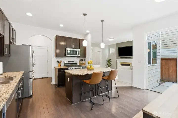 Whether you're enjoying breakfast at the island or hosting friends for dinner, this kitchen was designed to bring everyone together. Whether you're enjoying breakfast at the island or hosting friends for dinner, this kitchen was designed to bring everyone together.