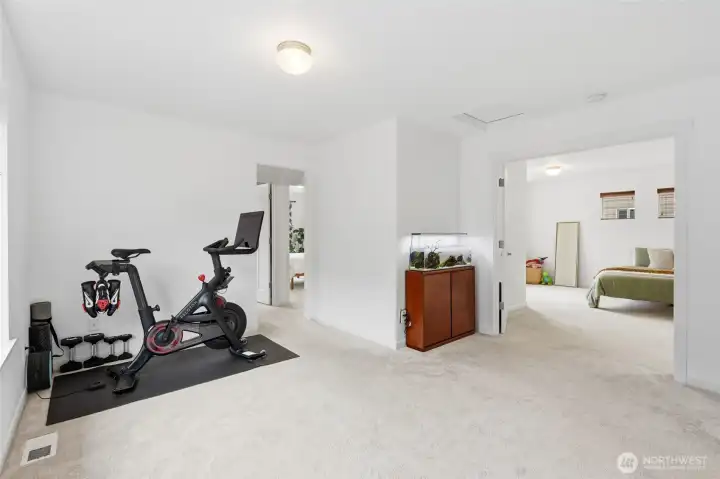 Spacious upstairs loft offers the flexibility to create a media room, home office, playroom, fitness area, or second living space. Spacious upstairs loft offers the flexibility to create a media room, home office, playroom, fitness area, or second living space.