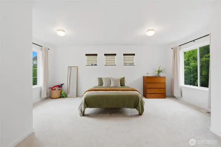 Retreat to the spacious primary suite, offering room to unwind with peaceful greenbelt views and abundant natural light. Retreat to the spacious primary suite, offering room to unwind with peaceful greenbelt views and abundant natural light.