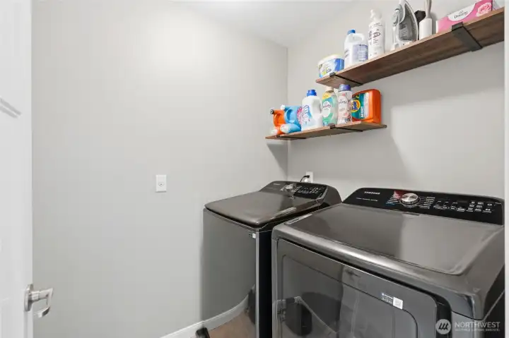 Convenient upstairs laundry room includes Samsung Smart Home washer and dryer, making laundry day a little easier. Convenient upstairs laundry room includes Samsung Smart Home washer and dryer, making laundry day a little easier.