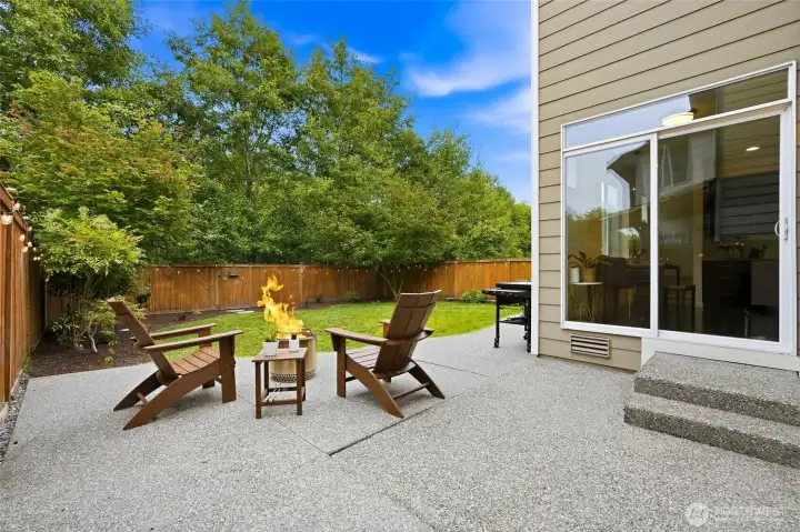 Unwind on the spacious patio overlooking your fully fenced backyard and peaceful greenbelt—the perfect setting for morning coffee, summer barbecues, or evenings by the fire. Unwind on the spacious patio overlooking your fully fenced backyard and peaceful greenbelt—the perfect setting for morning coffee, summer barbecues, or evenings by the fire.