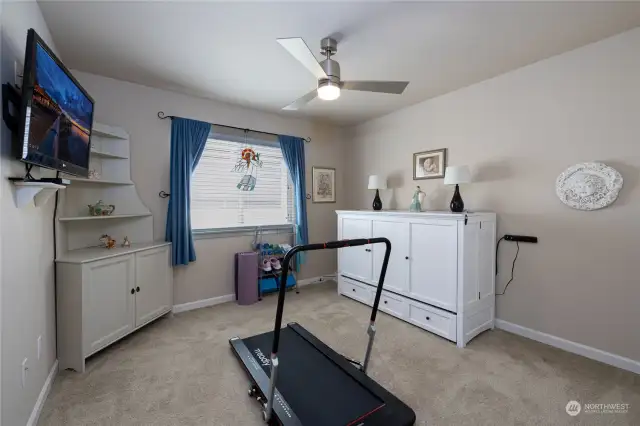 The three bedrooms are good sized and can be used for various purposes. This one has been used as an exercise room.