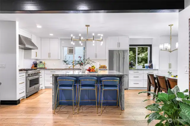 The island anchors this luxury kitchen.  Cook and entertain all at once here.