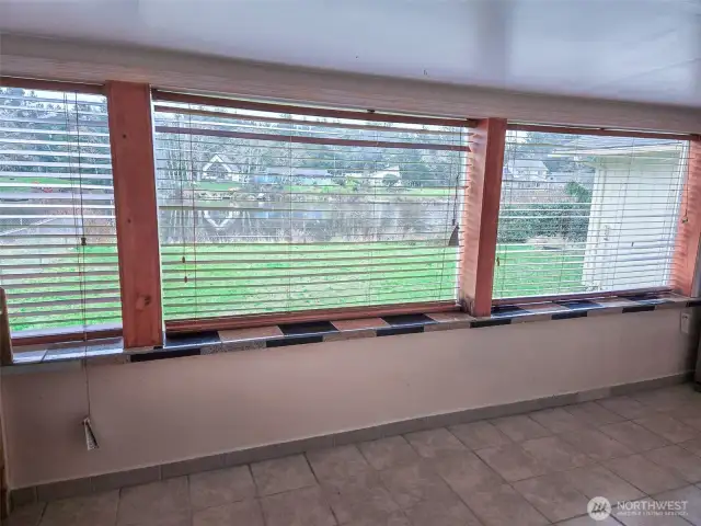 Windows from dining/kitchen