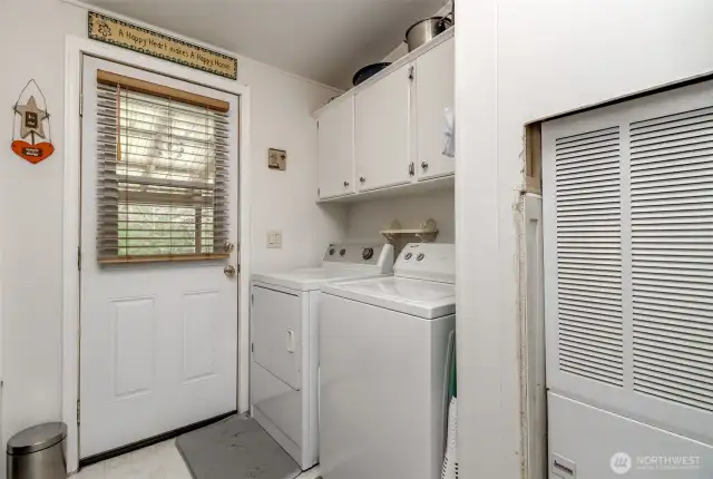 Laundry with access to backyard