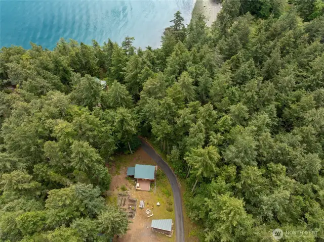 Aerial of shop, pumphouse, garden and upper parking area