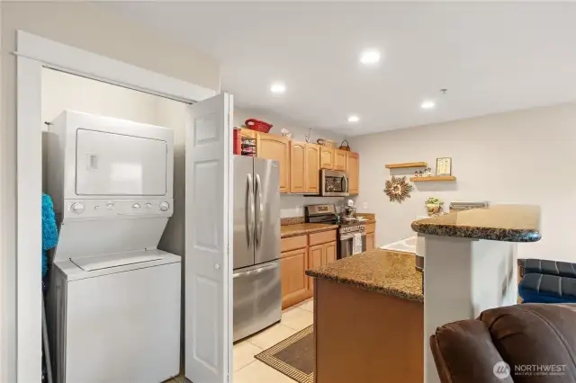 Convenient laundry closet off kitchen