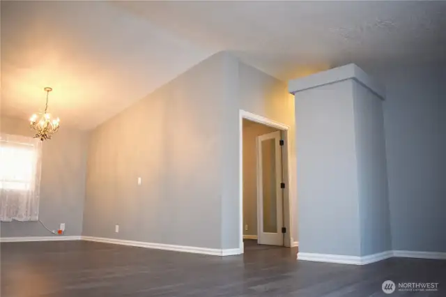 Dining area - hallway to the right leads to den, main bath, and two bedrooms