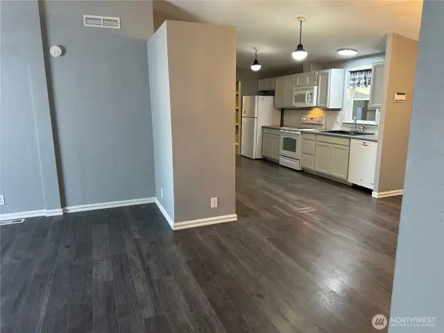 Living area into kitchen; dining area off to the right