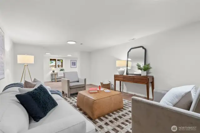 A fully finished basement includes the same luxury vinyl plank flooring as the main level providing a seamless flow to the lower level.
