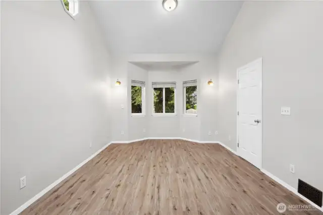 Primary Bedroom w/Bay Window and new Laminate Flooring.