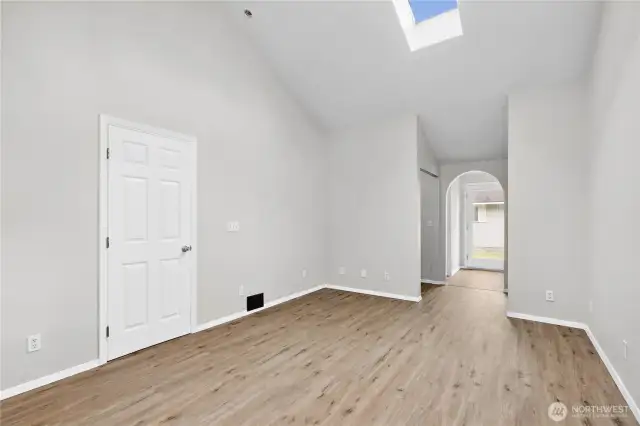 Primary Bedroom with Vaulted Ceilings with Skylights.