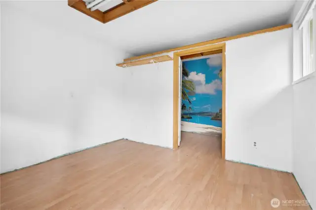 Interior of Finished Shed. Ready for your inspiration to finish this space! Newer Laminate Floors.