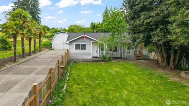 Notice the extra long paved driveway!
