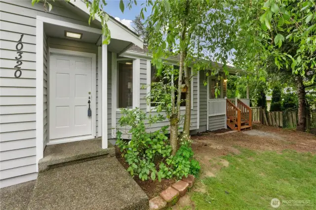 Let's go inside! (New Exterior Paint and Cute Porch is great for rocking!