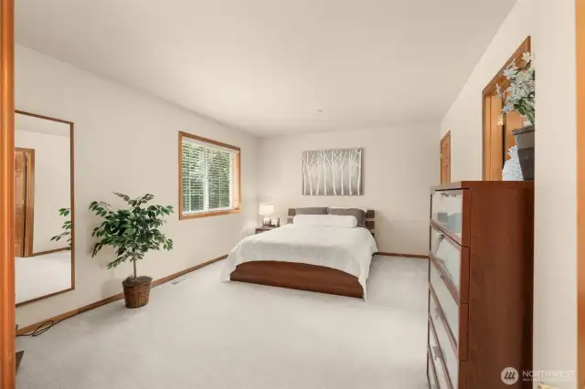 Double doors open to this spacious bedroom with walk-in closet and Jack and Jill bathroom.